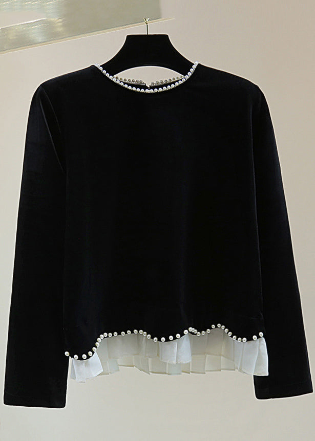 A Vintage Style Sweater with Delicate Timeless Details