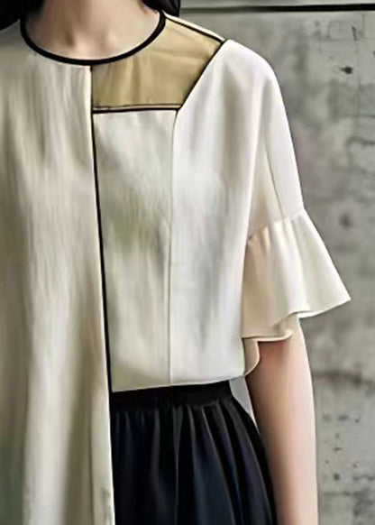 Well Tailored Top with a Graceful Silhouette