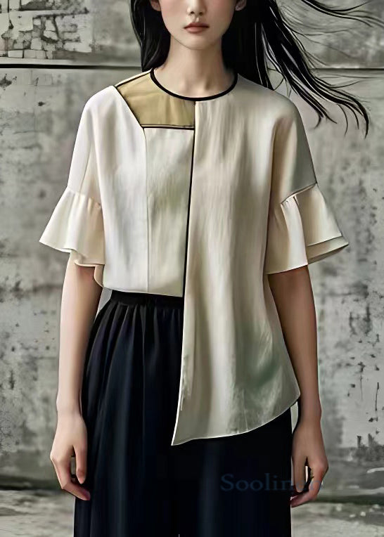 Well Tailored Top with a Graceful Silhouette