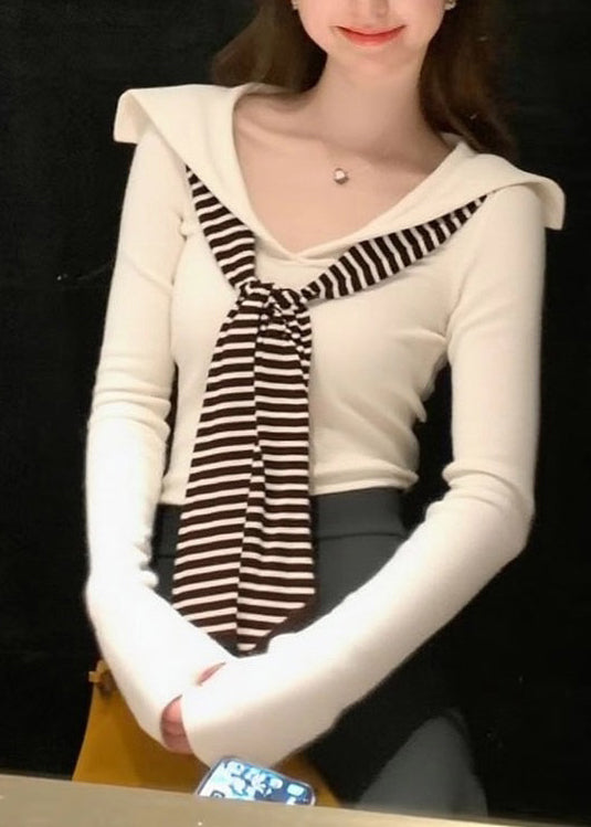 Well Tailored Top with a Graceful Silhouette