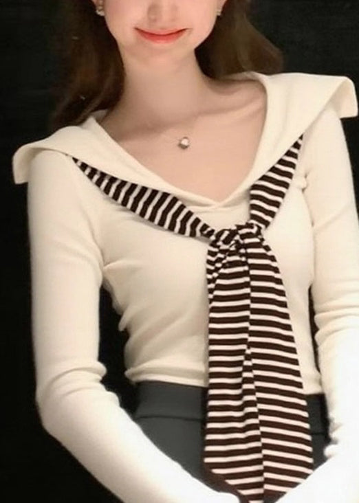 Well Tailored Top with a Graceful Silhouette