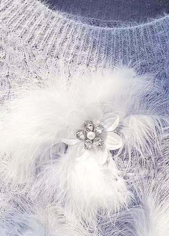 A Vintage Style Sweater with Delicate Timeless Details