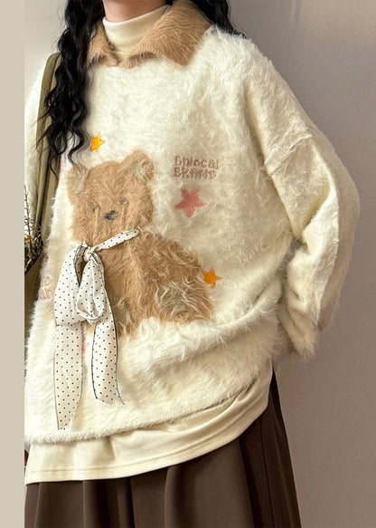 A Vintage Style Sweater with Delicate Timeless Details