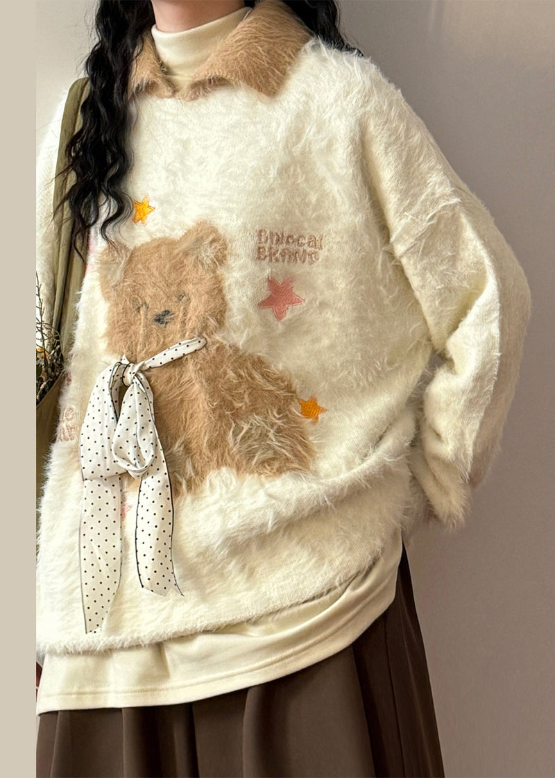 A Vintage Style Sweater with Delicate Timeless Details